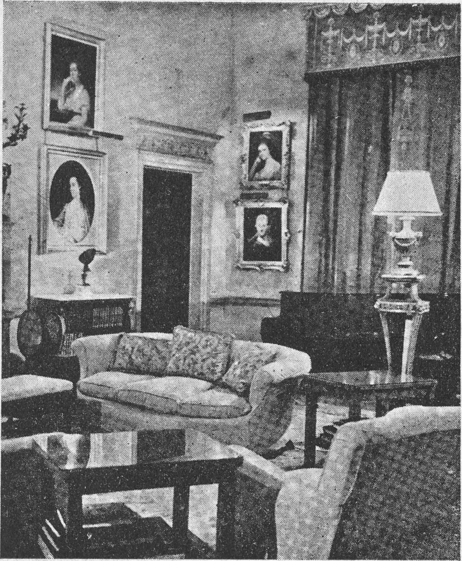 image/illustration region: غرفة جلوس حديثة مزينة بالصور